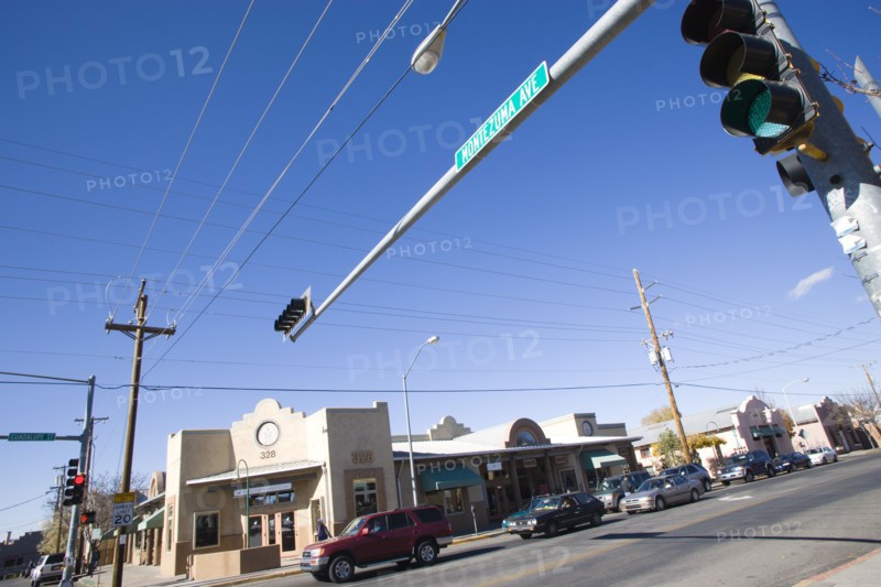 USA, New Mexico, Santa Fe, Cars stopped at overhead traffic lights at the junction with Montezuma Avenue