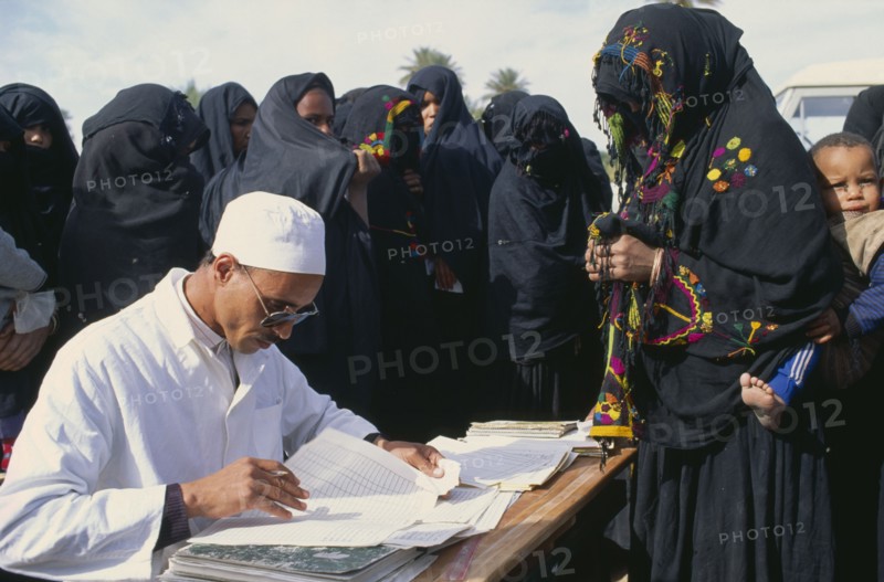 MOROCCO, South, Medical, Doctor visiting oasis comunity south of Zagora to give post natal care and advice to women and children.