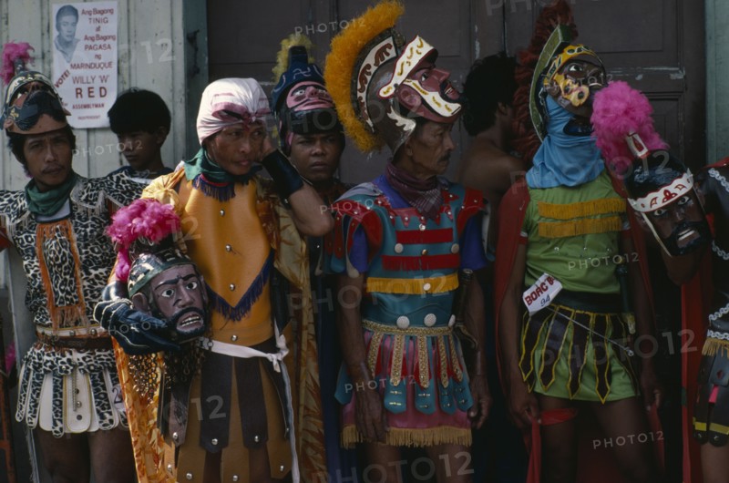 PHILIPPINES, Marinduque, Boac, Moriones Festival passion play re-enactment of the story of the Roman soldier Longinus and the crucifixtion of Jesus.  Local men dressed as Roman soldiers with masks.