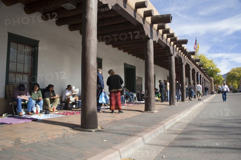 USA, New Mexico, Santa Fe, Native American Pueblo Indian market stalls under the arches of the Governors Palace in the Plaza