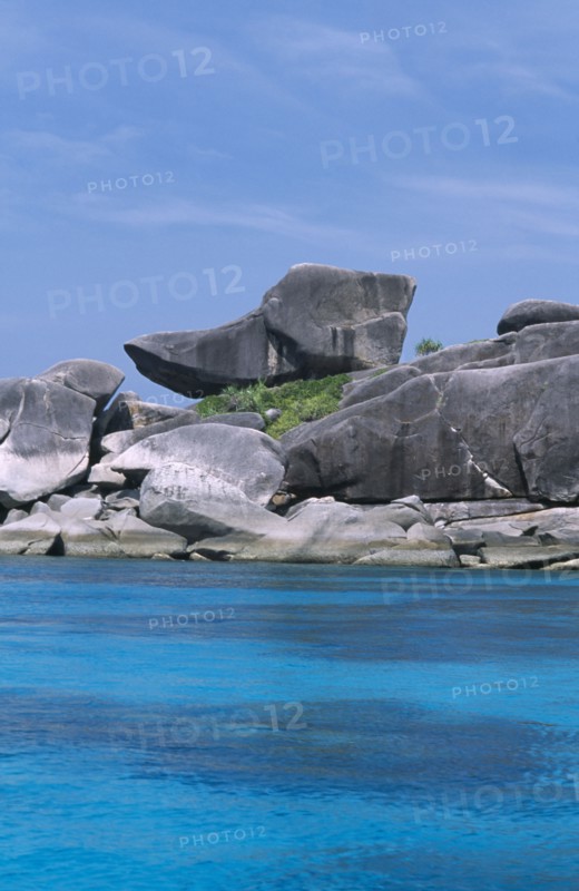 THAILAND, Koh Similan  , Donald Duck Bay, A rock which resembles the cartoon character perches next to other large boulders.