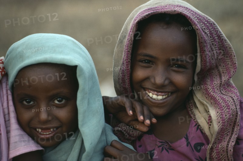 SUDAN, East, Tawawa Settlement, Head and shoulders portrait of two Ethiopian refugee girls.