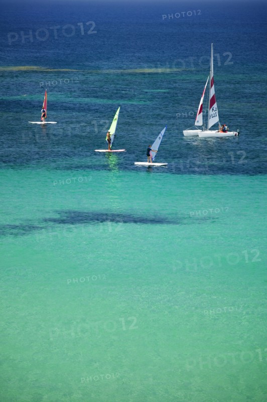 SPAIN, Balearic Islands, Ibiza, "Wind surfing at Platja des Pujols, Formentera."