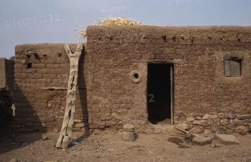 MALI, Housing, Mud brick village home.