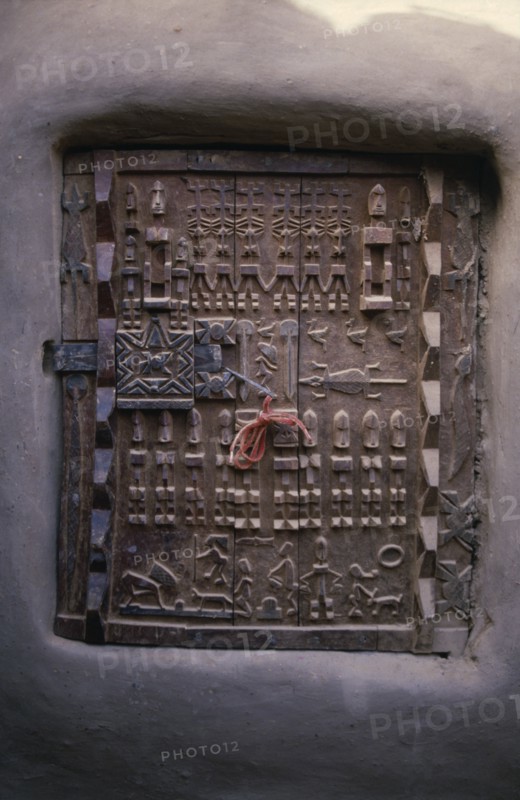 MALI, Bandiagara Escarpment, Sangha, Detail of carved granary door.