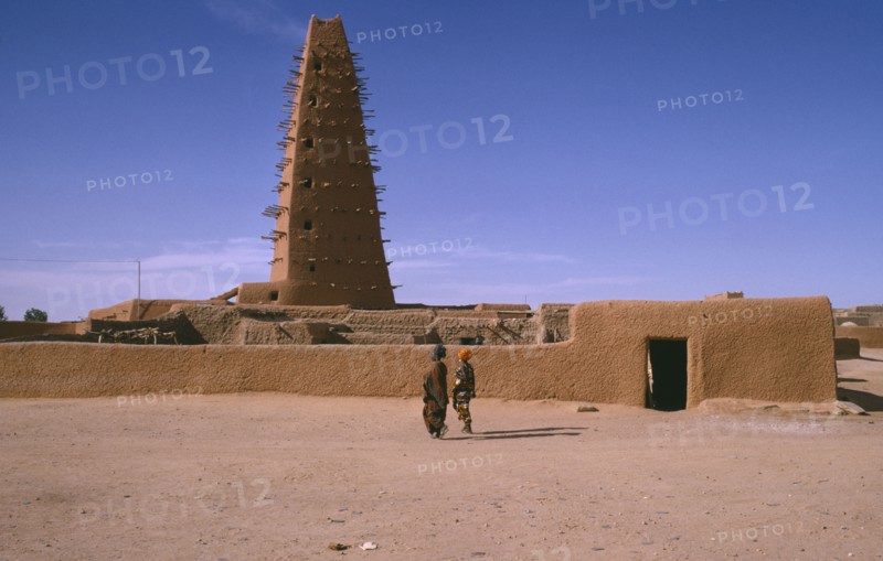 NIGER, Agades, The Grand Mosquee.  Originally built in 1515 and then renovated and rebuilt in 1844 in the original style with wooden support beams protruding from single minaret.