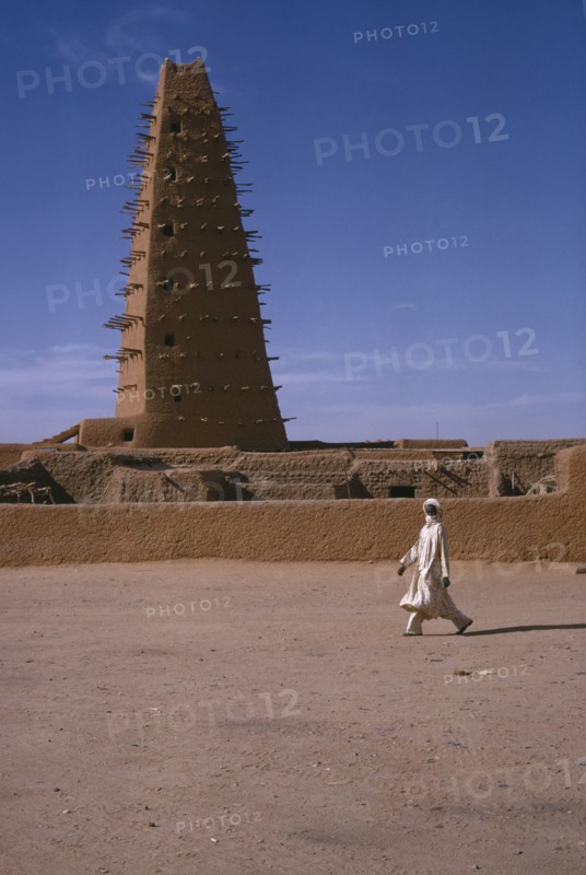 NIGER, Agades, The Grand Mosquee.  Originally built in 1515 and then renovated and rebuilt in 1844 in the original style with wooden support beams protruding from single minaret.