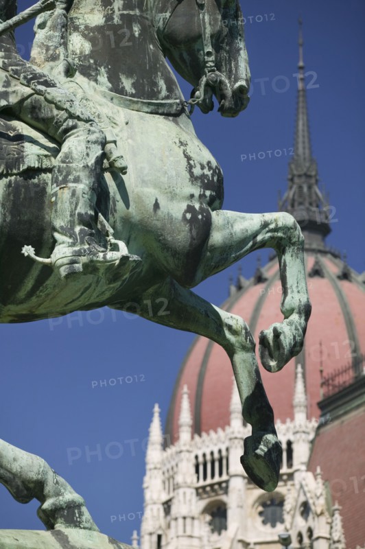HUNGARY, Budapest, "Detail of equestrian statue, Rakoczi, with Parliament behind."