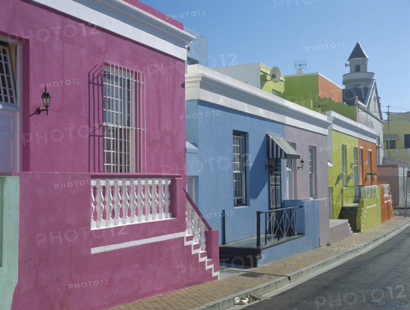 SOUTH AFRICA, Western Cape, Cape Town, Bo Kapp District. Chiappini Street. A row of brightly painted houses in an area famous for its colourful architecture