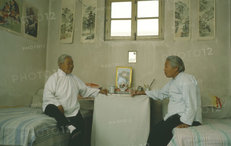 CHINA, Shanghai, Couple in old people’s home.