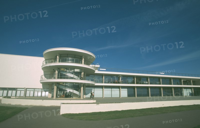 ENGLAND, East Sussex, Bexhill on Sea, De La Warr Pavilion. Exterior view from seafront towards back entrance with staircase section and terracing.