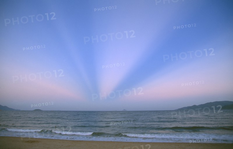 VIETNAM, South, Nha Trang, Unusual atmospheric phenomenon in sky at dusk over sea.