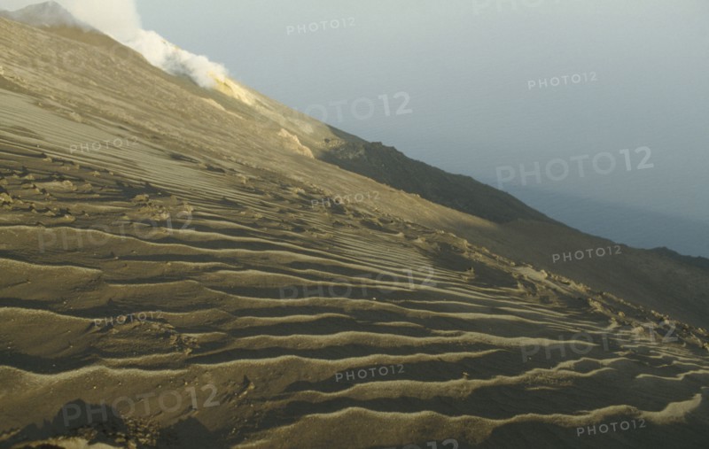 ITALY, Sicily, Stromboli Island, Volcanic landscape and smoking cone.