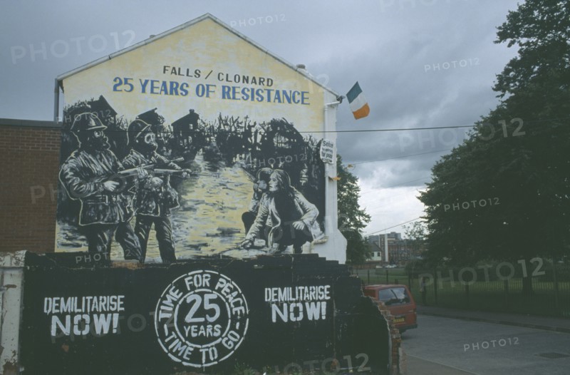 IRELAND, North, Belfast, Falls Road. Mural displaying twenty five years of troubles