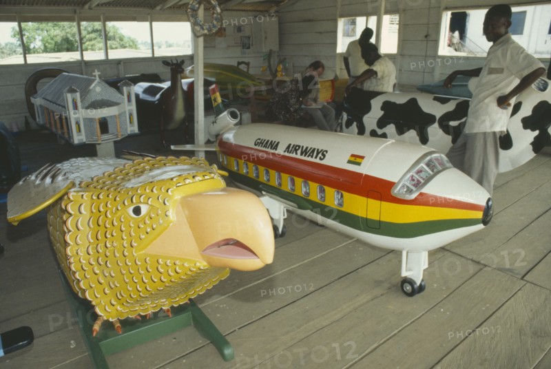 GHANA, Accra, Painted coffins in the shap of a Aeroplane and Eagle.