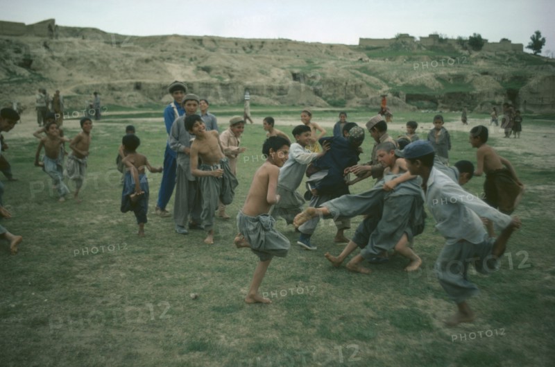 PAKISTAN, Children, Play, Hunza children playing tag.