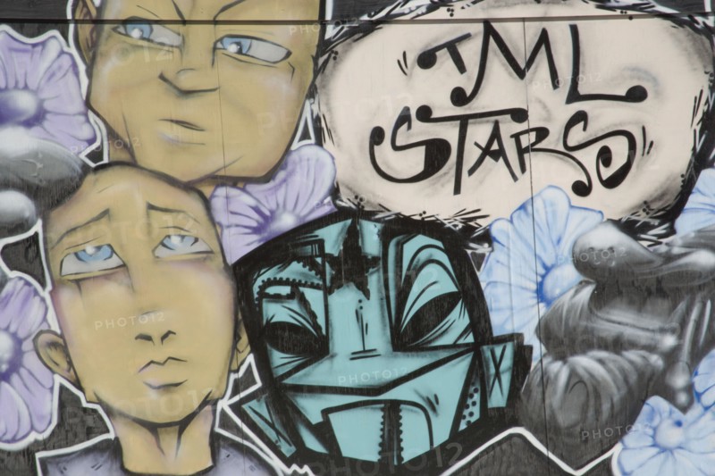 ENGLAND, East Sussex, Brighton, Colourful graffiti on wall.