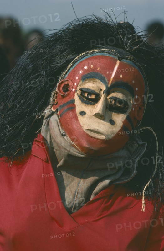GABON, Gunga, Masked dancer at Gunga festival.