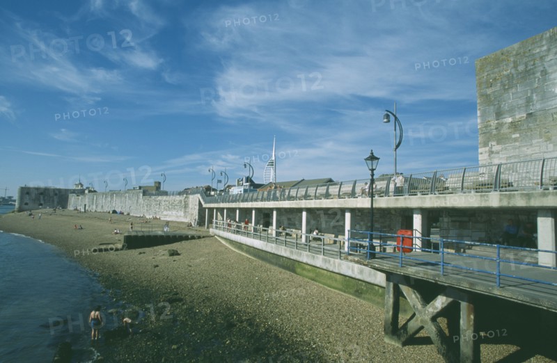 ENGLAND, Hampshire, Portsmouth, Old Portsmouth. View across occupied strectch of beach next to the Walls.