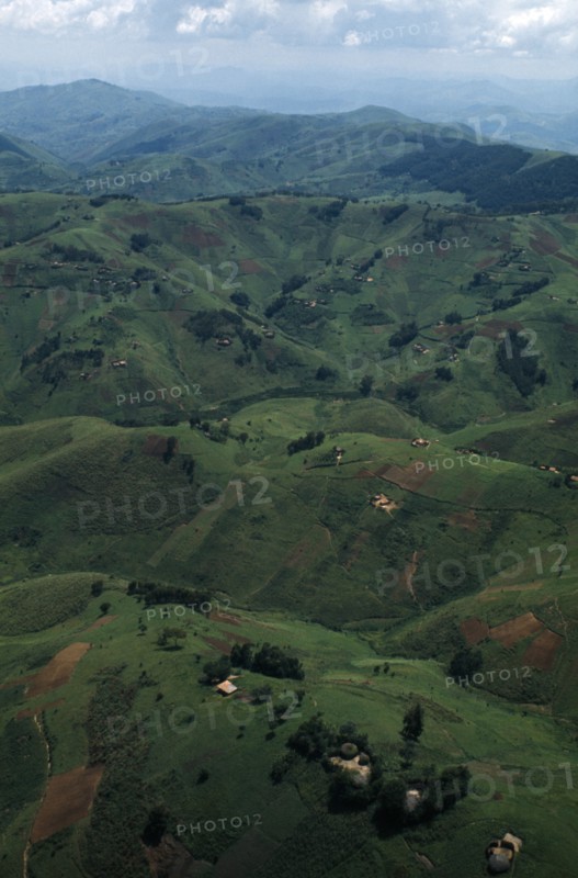 RWANDA, Landscape, Agricultural landscape with scattered huts and small holdings.