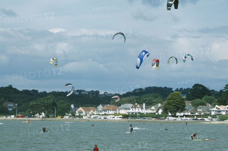 ENGLAND, Dorset, Sandbanks, Poole Harbour. Kite Surfing