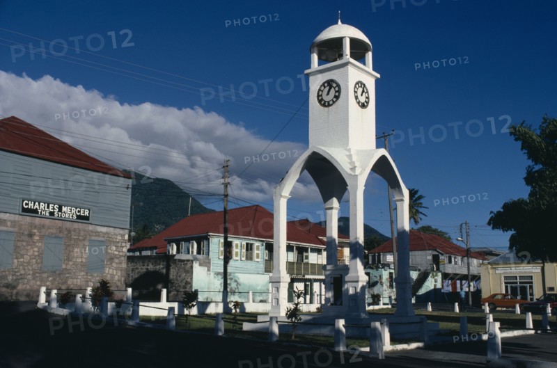 MONTSERRAT, Plymouth, Town square and clock tower prior to volcanic eruption.
