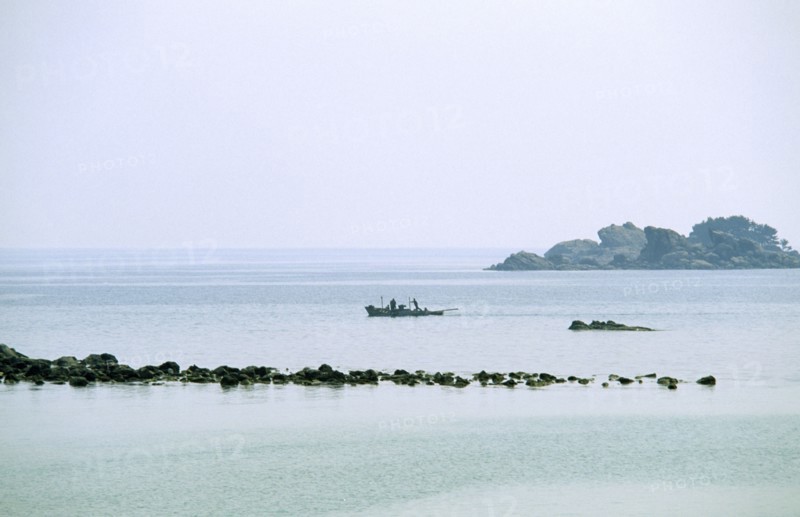 NORTH KOREA, East Coast, Tongjoson Bay, Distant fishing boat.