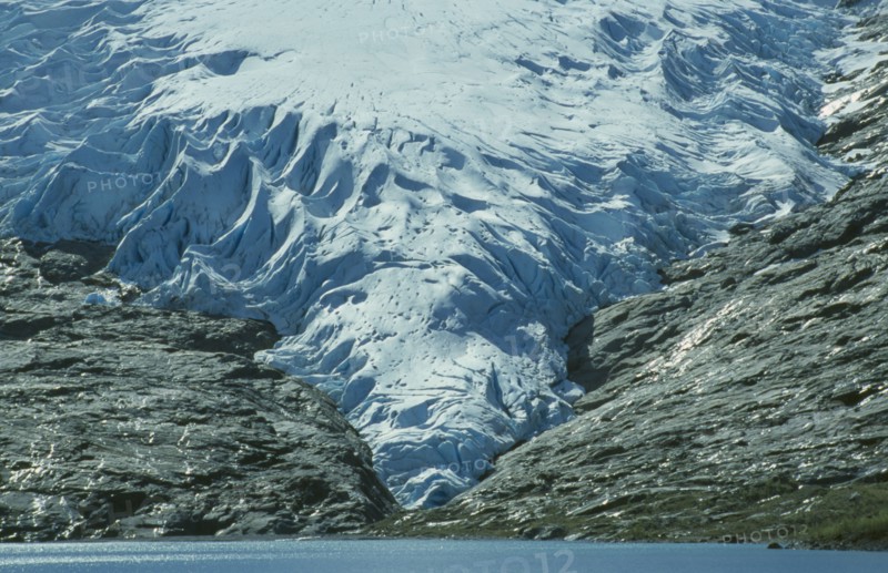 NORWAY, Svartisen Glacier, Rocky coastline.