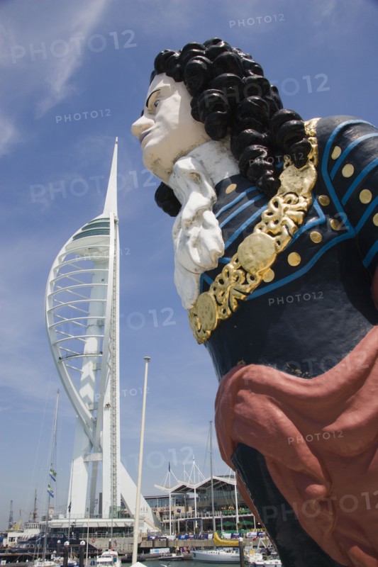 ENGLAND, Hampshire, Portsmouth, The Spinnaker Tower the tallest public viewing platforn in the UK at 170 metres on Gunwharf Quay with old ships bowspit figurehead in the foreground