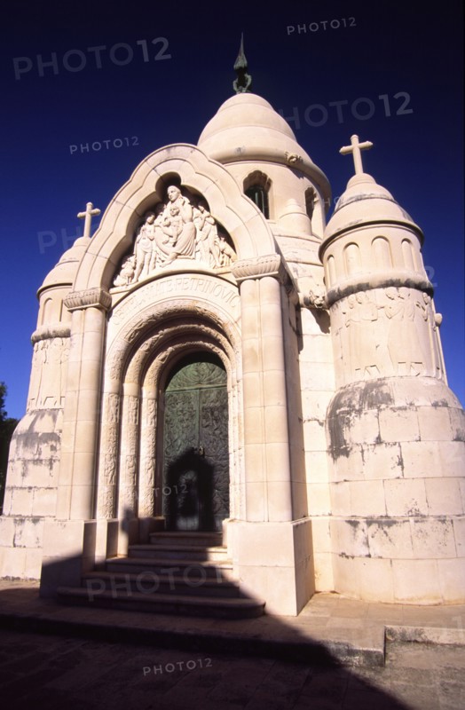 CROATIA, Dalamatia, Brac, Supetar Petrinovic mausoleum. The Petrinovic mausoleum by Toma Rosandic lies at the western edge of the town cemetary. with its neo Byzantine dome and sculpted pillars