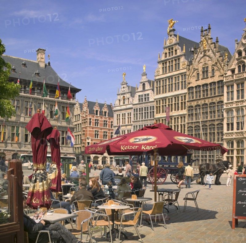 BELGIUM, Flemish Region, Antwerp., "Cafe in Grote Markt, Main Square with a horse and carriage behind."