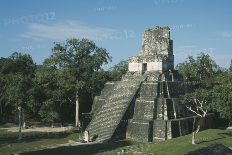 GUATEMALA, El Peten, Tikal, "Mayan Ruins, 200BC to 900AD. Temple II, Temple of the Masks, 38 Meters. Great Plaza."