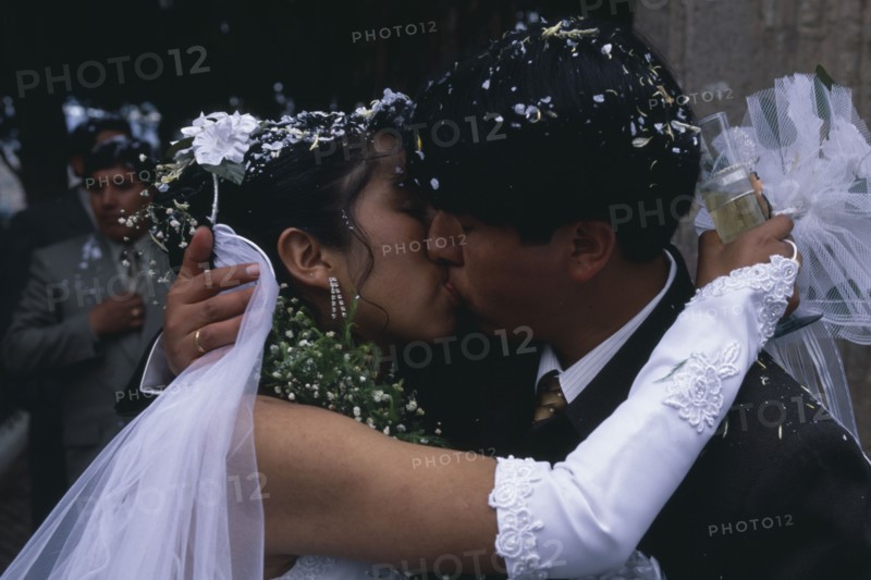 BOLIVIA, La Paz, Wedding in El Monticulo. Bride and Groom kissing.