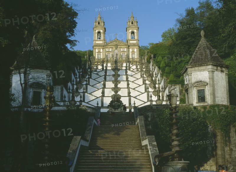 PORTUGAL, Minho, Bom Jesus do Monte, Church east of Braga with baroque stairway with white painted walls lined with statues representing an upward spiritual journey