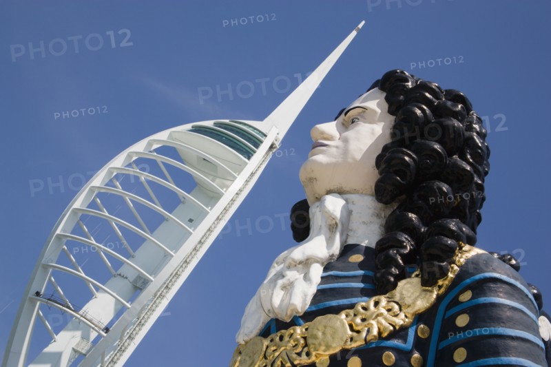ENGLAND, Hampshire, Portsmouth, The Spinnaker Tower the tallest public viewing platforn in the UK at 170 metres on Gunwharf Quay with old ships bowspit figurehead in the foreground