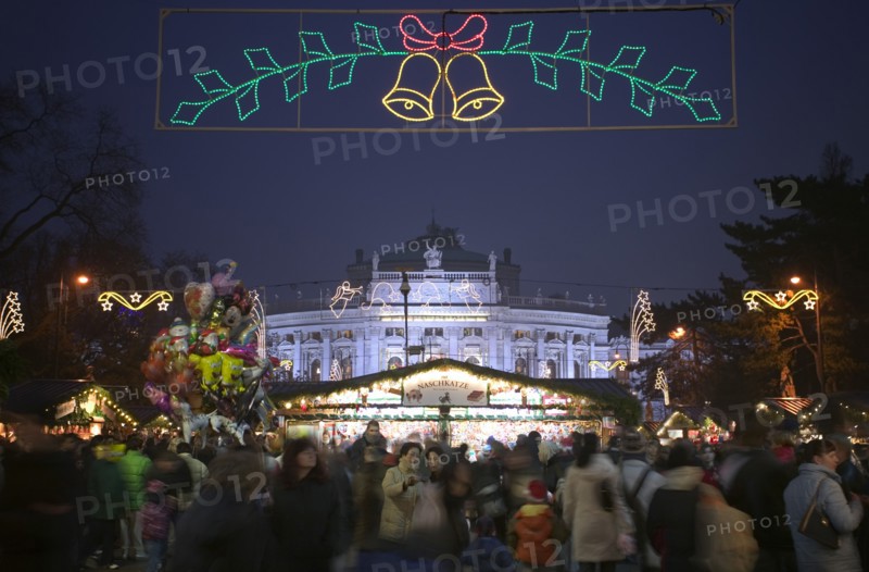 AUSTRIA, Lower Austria, Vienna, The Rathaus Christmas Market with The Burgtheater in the background.