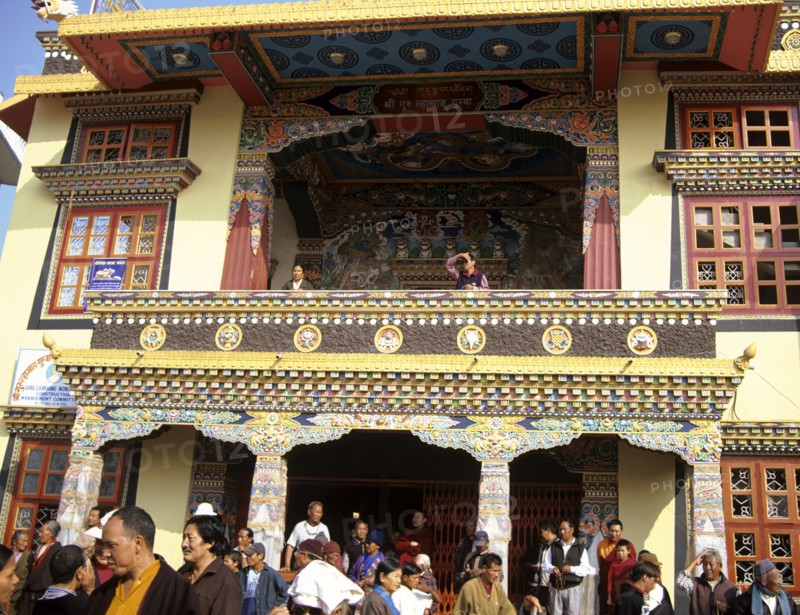 NEPAL, Kathmandu,  A highly decorated temple outside Swayambhunath Stupa busy because its the day of the full moon an important day for Buddhists