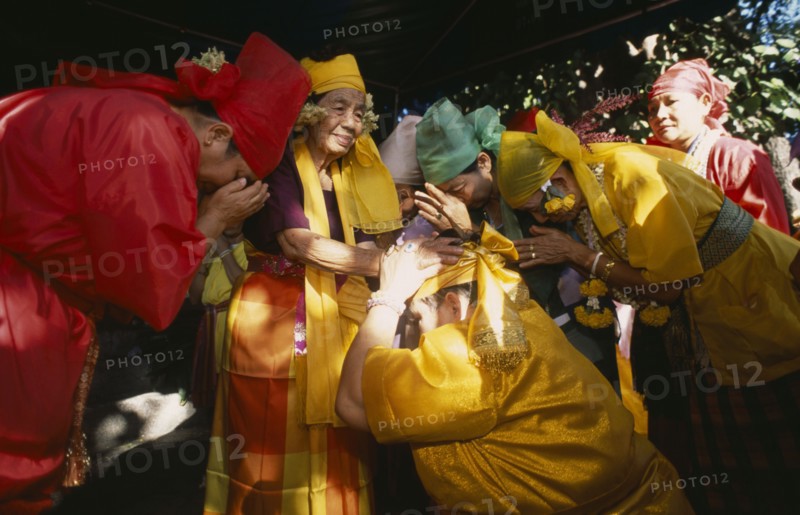 THAILAND, Chiang Mai, Sect of Spirit Worshippers at prayer and receiving blessing.