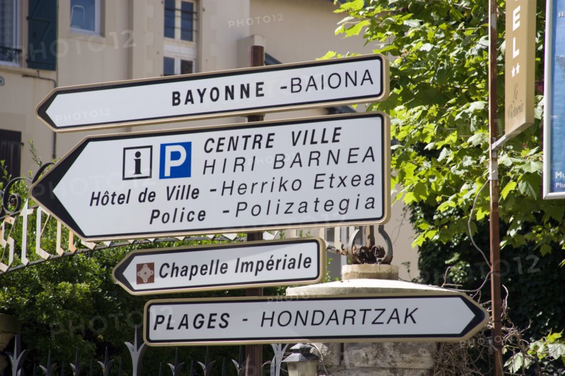 FRANCE, Aquitaine Pyrenees Atlantique, Biarritz, The Basque seaside resort on the Atlantic coast. Bilingual roadsign in the centre of the town. French and Basque language.