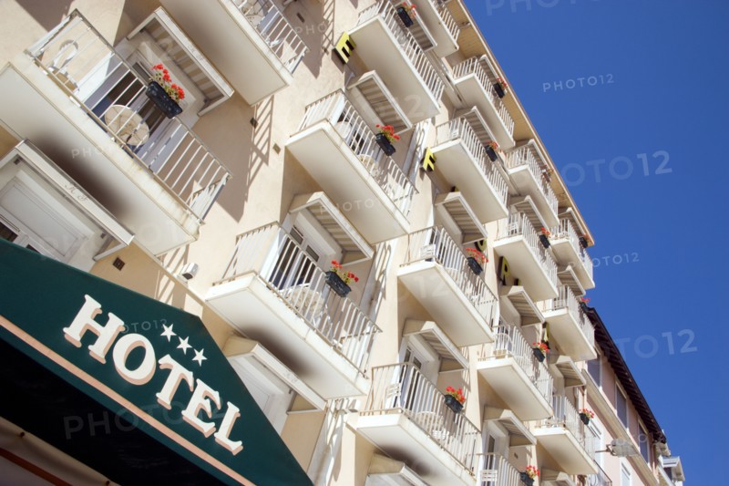 FRANCE, Aquitaine Pyrenees Atlantique, Biarritz, The Basque seaside resort on the Atlantic coast. Three star hotel sign and balconies