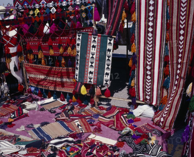 KUWAIT, Kuwait City, Bedouin woven textiles for sale at the Friday Market or souq.