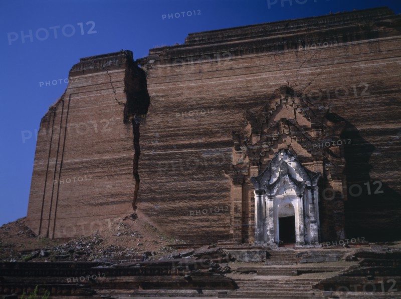 MYANMAR, Mingun, Mingun Paya exterior facade of unfinished pagoda begun in 1790 which suffered earthquake damage in 1938.