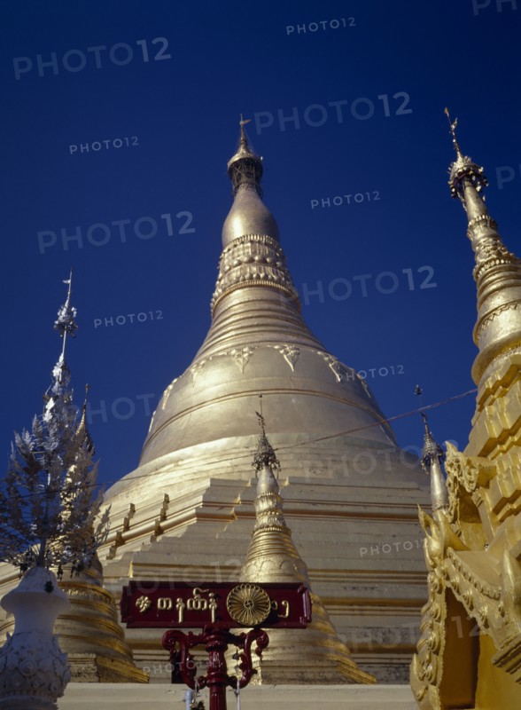 MYANMAR, Yangon, Shwedagon Paya.  Golden exterior of main stupa.