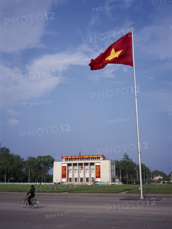 VIETNAM, North, Hanoi, Ho Chi Minh Mausoleum and passing cyclist.