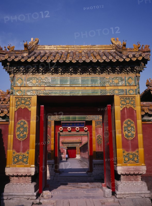 CHINA, Beijing, Forbidden City.  Looking through highly decorated sequence of doorways.