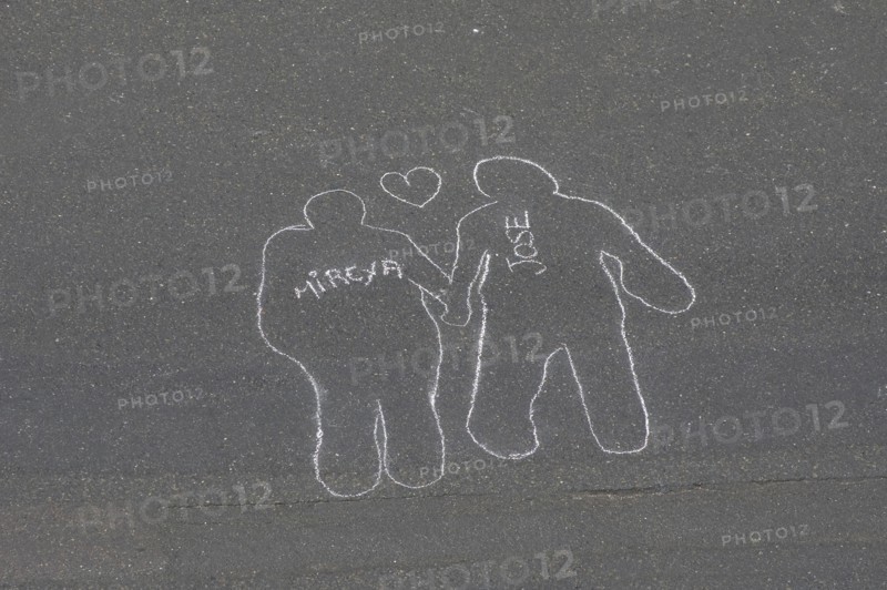 VENEZUELA, Caracas, Chalk outlines with the names of participants in an event on Avenida Francisco de Miranda to protest increasing levels of violence.