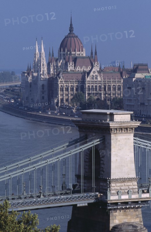 HUNGARY, Budapest, Cityscape.  View towards Parliament building with part view of Chain Bridge in the foreground. Eastern Europe