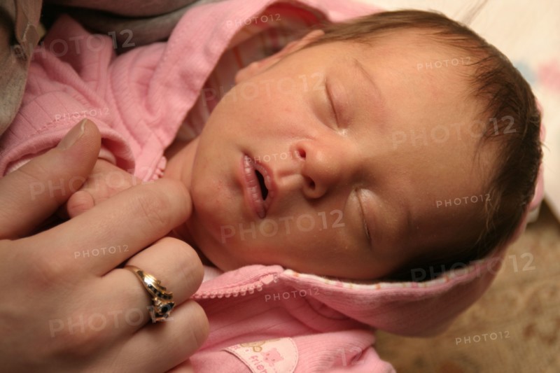 CHILDREN, Babies, Birth, "Kylan Stone, newborn baby girl holding mothers finger, 10 days old."