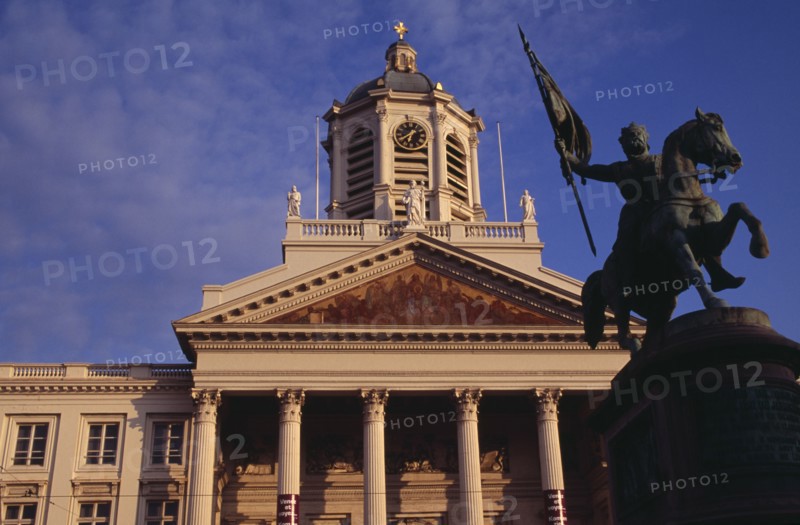 BELGIUM, Brabant, Brussels, Royal Square.  Exterior facade of Church of Saint James with equestrian statue of Godfrey of Bouillon leader of the first crusade in 1096 in foreground.