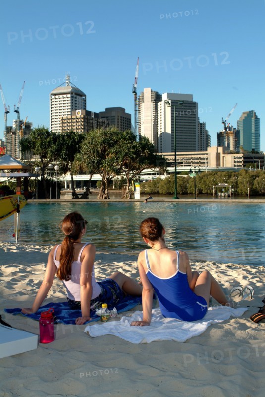 Australia, Queensland, Brisbane, Sunbathers in the Southbank Complex - Brisbane